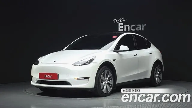 Tesla Model Y 2021 — photo 1