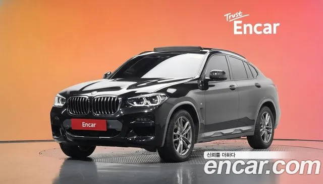 BMW X4 2021 — photo 1