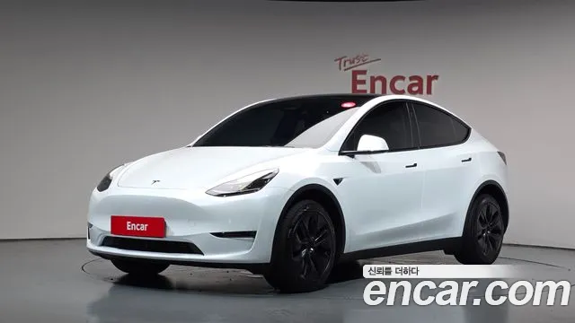 Tesla Model Y 2024 — photo 1