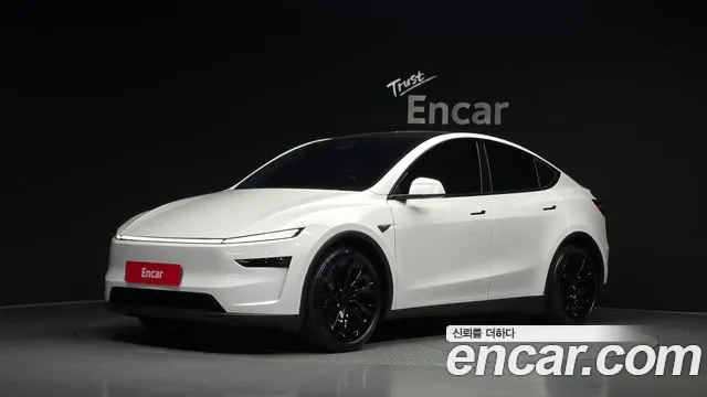 Tesla Model Y 2025 — photo 1