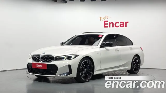 BMW 3-Series 2023 — photo 1