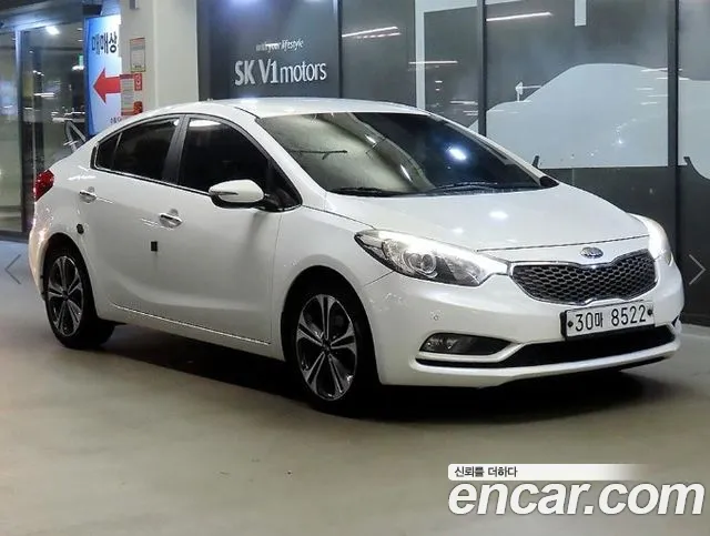 Kia K3 2013 — photo 1