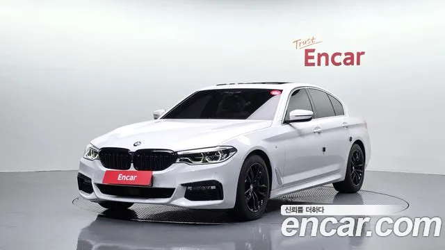 BMW 5-Series 2018 — photo 1
