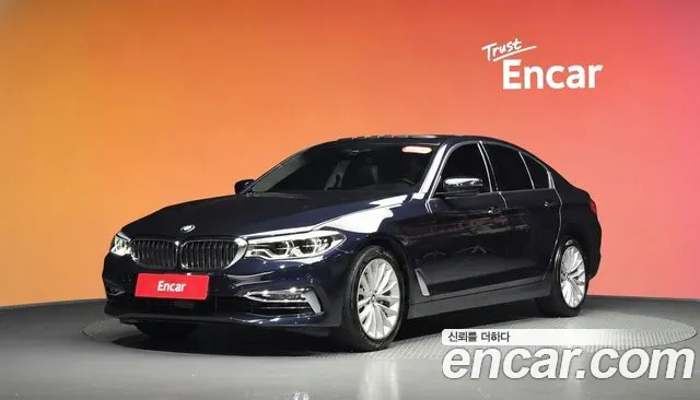 BMW 5-Series 2018 — photo 1