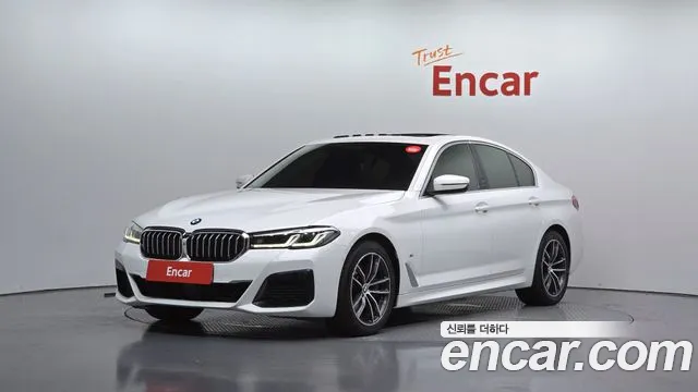 BMW 5-Series 2022 — photo 1