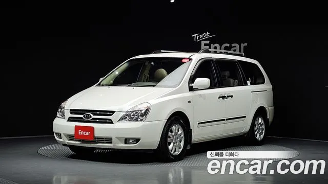 Kia Canival 2006 — photo 1