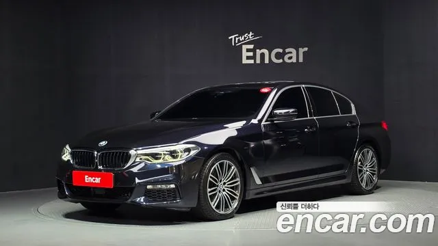 BMW 5-Series 2018 — photo 1