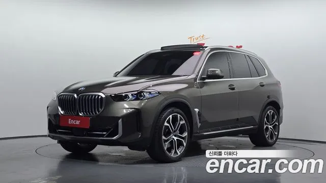 BMW X5 2024 — photo 1