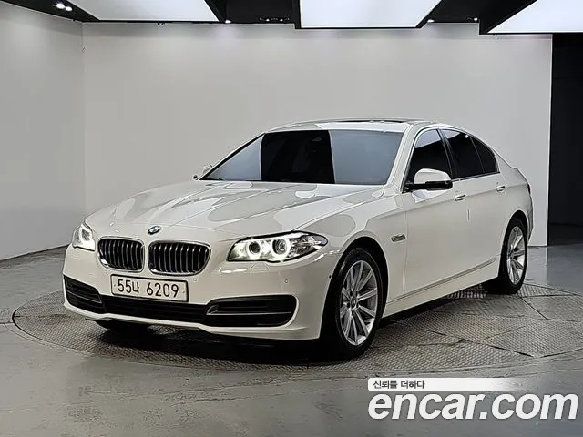 BMW 5-Series 2014 — photo 1