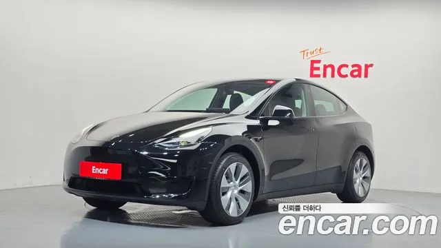 Tesla Model Y 2023 — photo 1