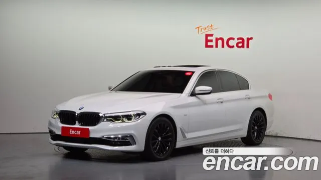 BMW 5-Series 2018 — photo 1