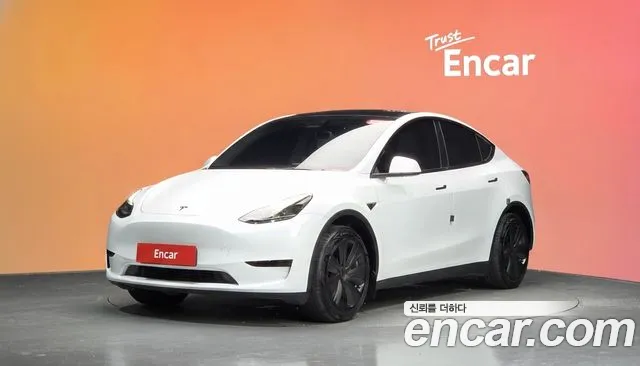 Tesla Model Y 2024 — photo 1