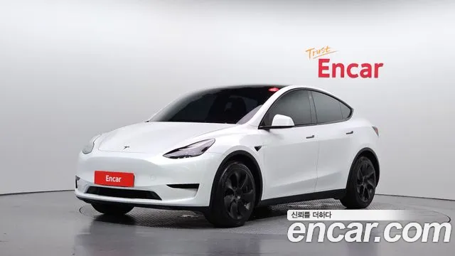 Tesla Model Y 2023 — photo 1