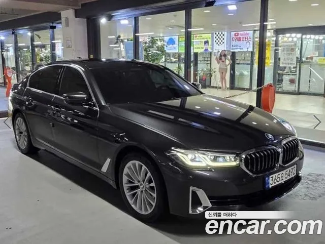 BMW 5-Series 2021 — photo 1