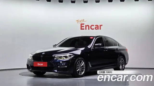 BMW 5-Series 2018 — photo 1