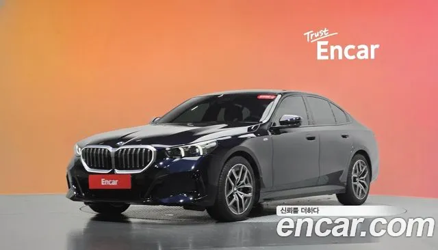 BMW 5-Series 2024 — photo 1