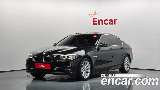 BMW 5-Series 2015 — photo 1
