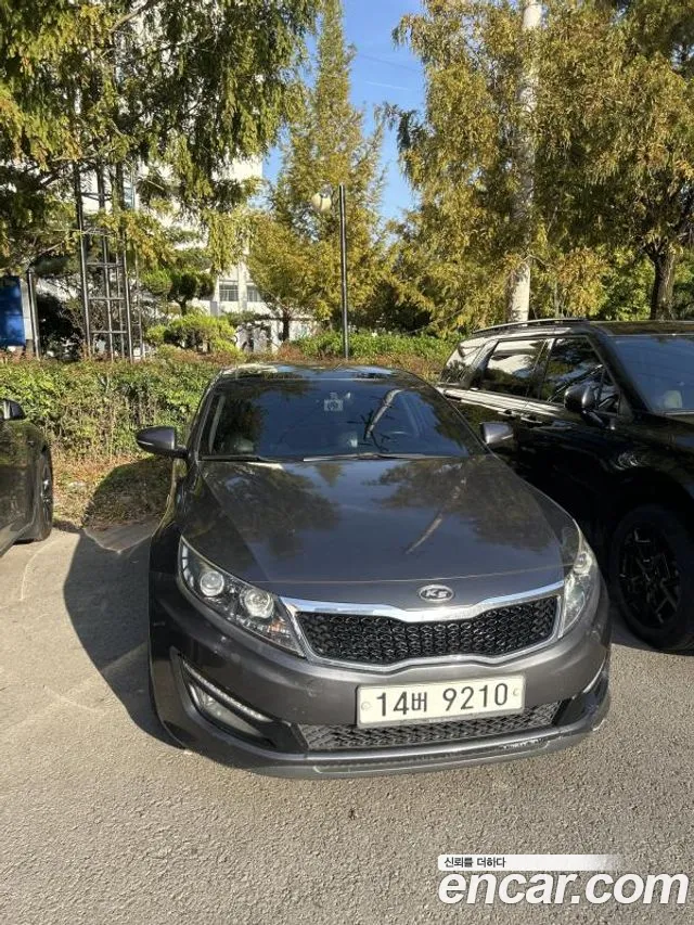 Kia K5 2011 — photo 1