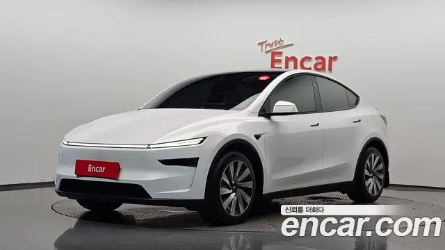 Tesla Model Y 2025 — photo 1