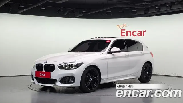 BMW 1-Series 2018 — photo 1
