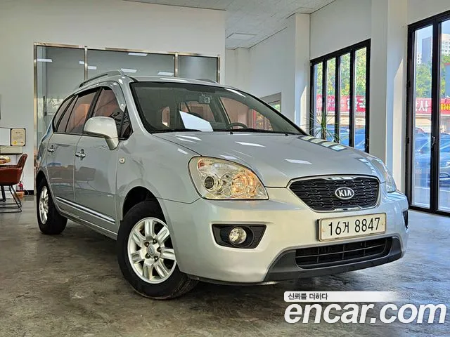 Kia Carens 2011 — photo 1