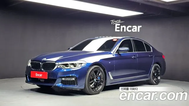 BMW 5-Series 2018 — photo 1