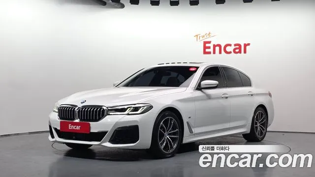 BMW 5-Series 2021 — photo 1