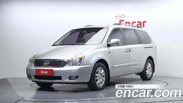 Kia Canival 2013 — photo 1