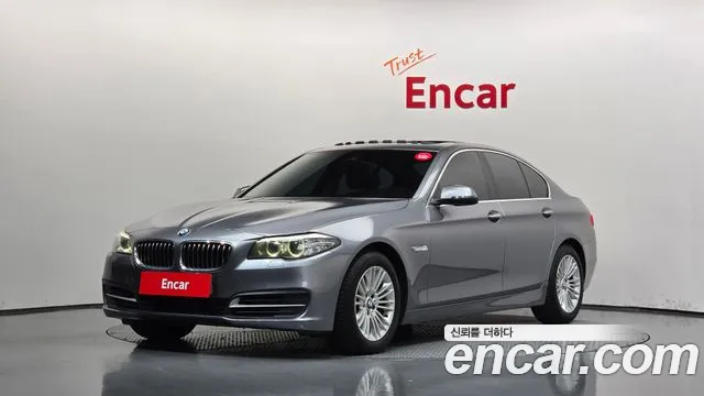BMW 5-Series 2014 — photo 1