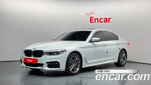 BMW 5-Series 2018 — photo 1
