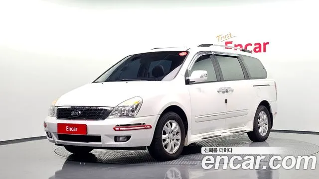 Kia Canival 2013 — photo 1