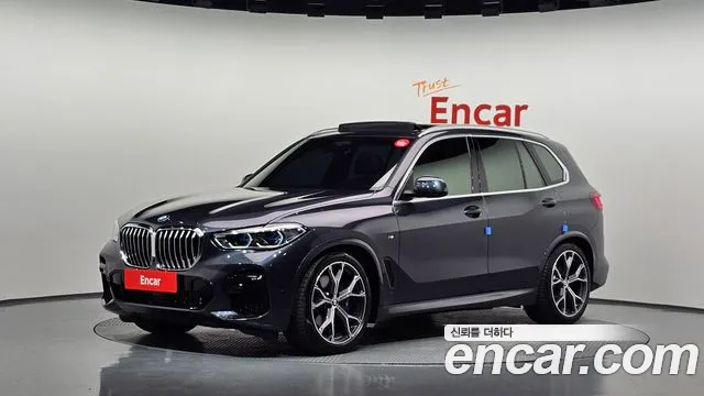 BMW X5 2022 — photo 1