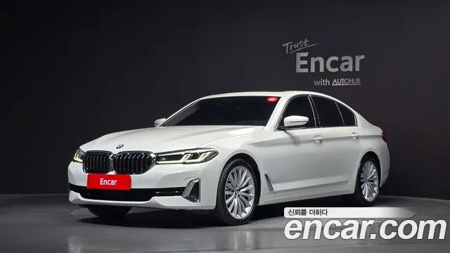 BMW 5-Series 2023 — photo 1