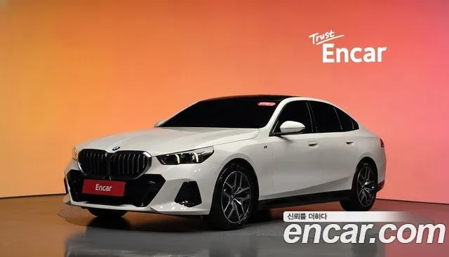 BMW 5-Series 2024 — photo 1
