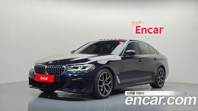 BMW 5-Series 2023 — photo 1