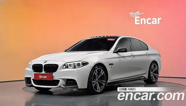BMW 5-Series 2014 — photo 1