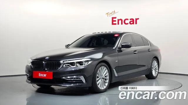 BMW 5-Series 2018 — photo 1