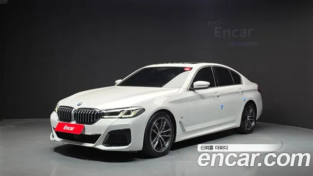 BMW 5-Series 2022 — photo 1