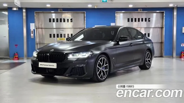 BMW 5-Series 2023 — photo 1