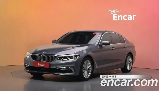 BMW 5-Series 2018 — photo 1