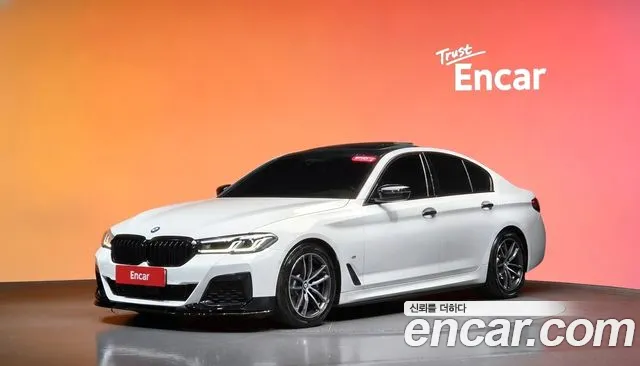BMW 5-Series 2023 — photo 1