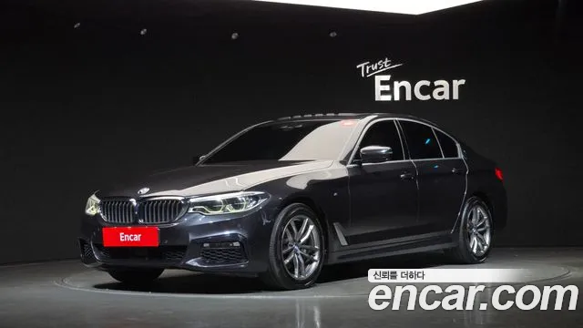 BMW 5-Series 2018 — photo 1