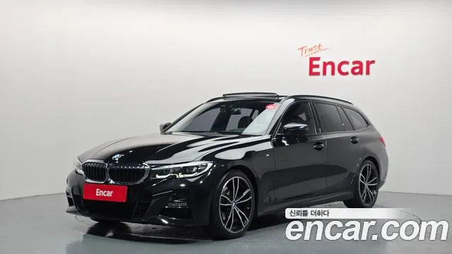 BMW 3-Series 2021 — photo 1