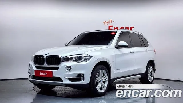 BMW X5 2015 — photo 1