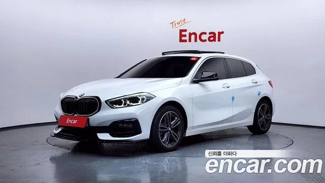 BMW 1-Series 2022 — photo 1
