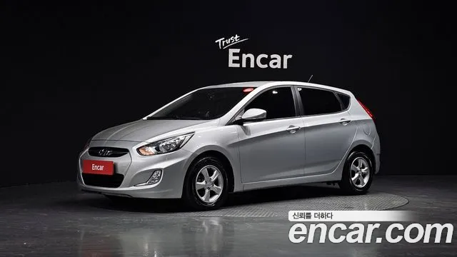 Hyundai Accent 2012 — photo 1