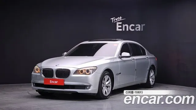 BMW 7-Series 2011 — photo 1