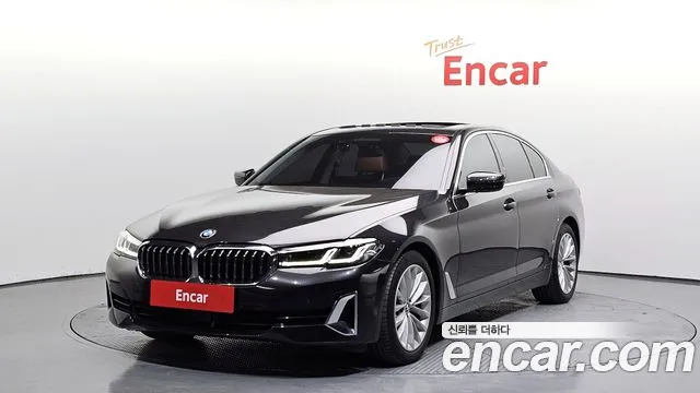 BMW 5-Series 2021 — photo 1