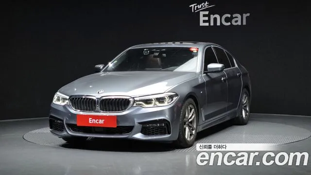 BMW 5-Series 2019 — photo 1