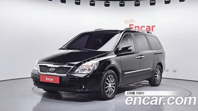 Kia Canival 2012 — photo 1